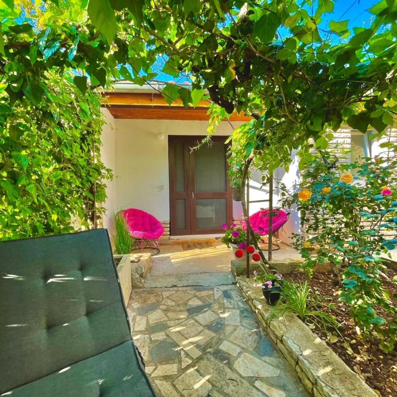 Lovely flower small house for two by the sea photo