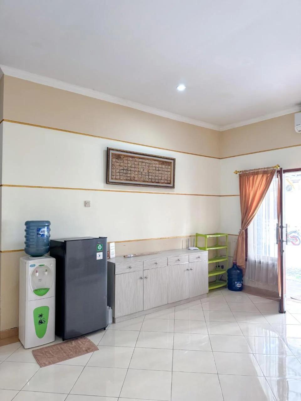 Adiputra Guesthouse Tata Bumi by HomiQ photo
