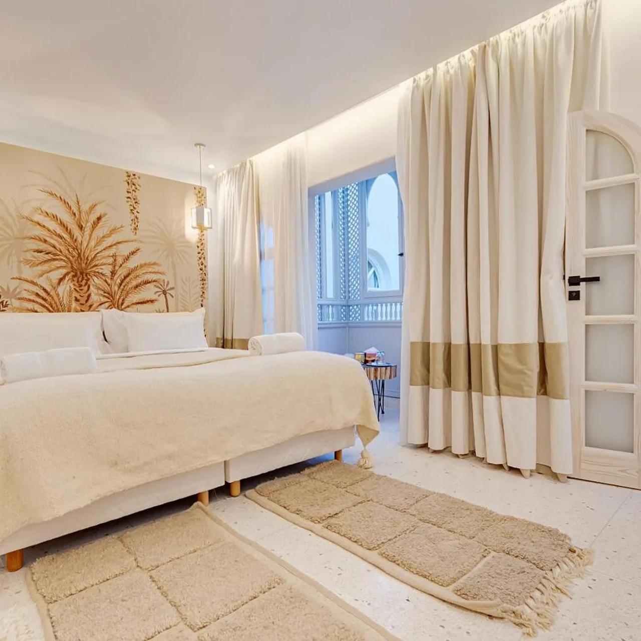 Riad K-white photo