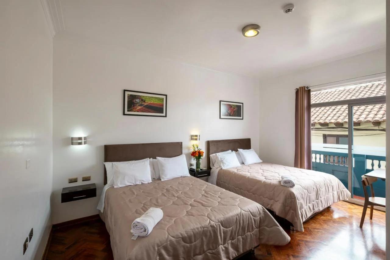 Hostal & Apartments El Triunfo foto
