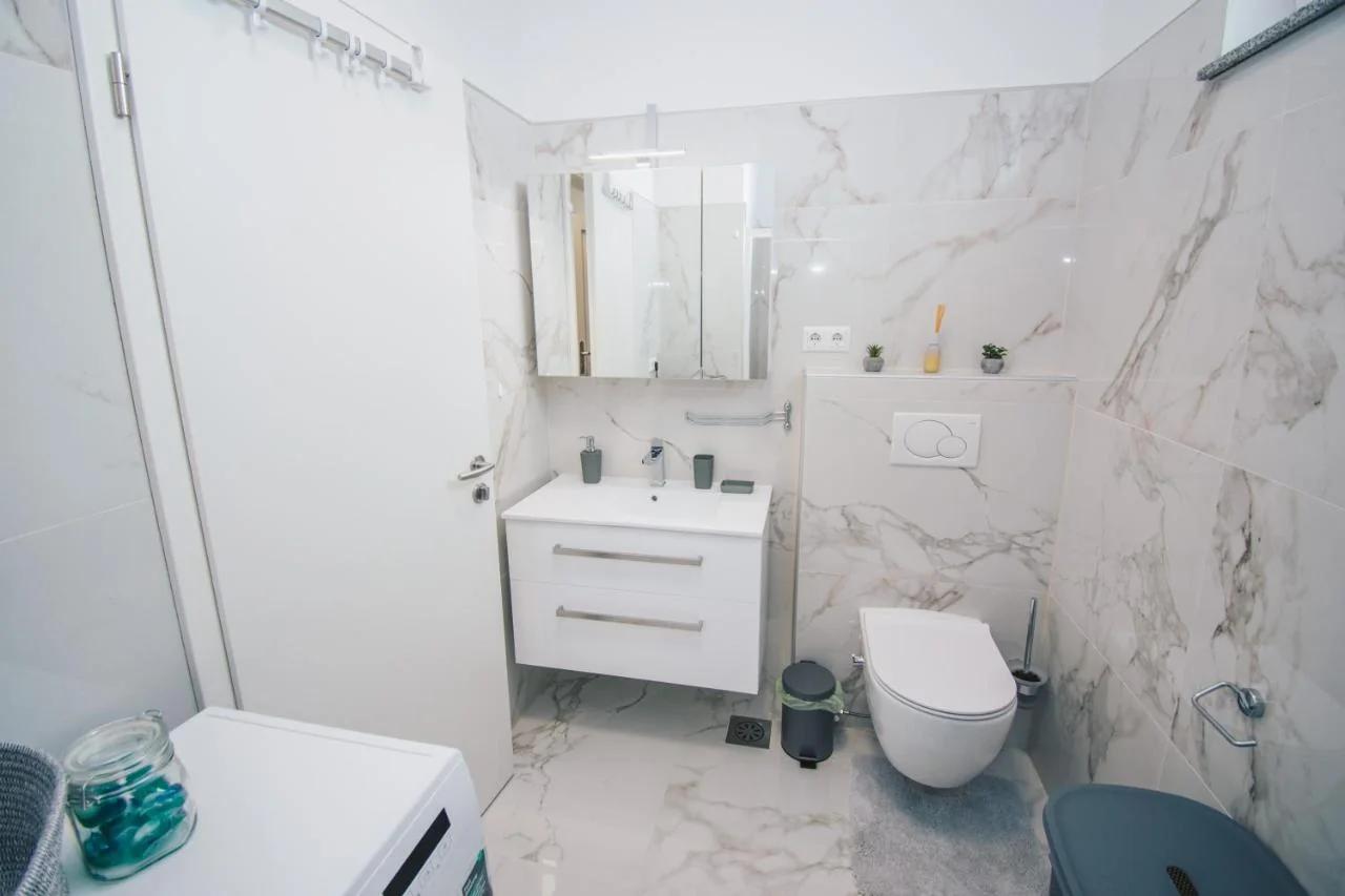 L Apartment photo