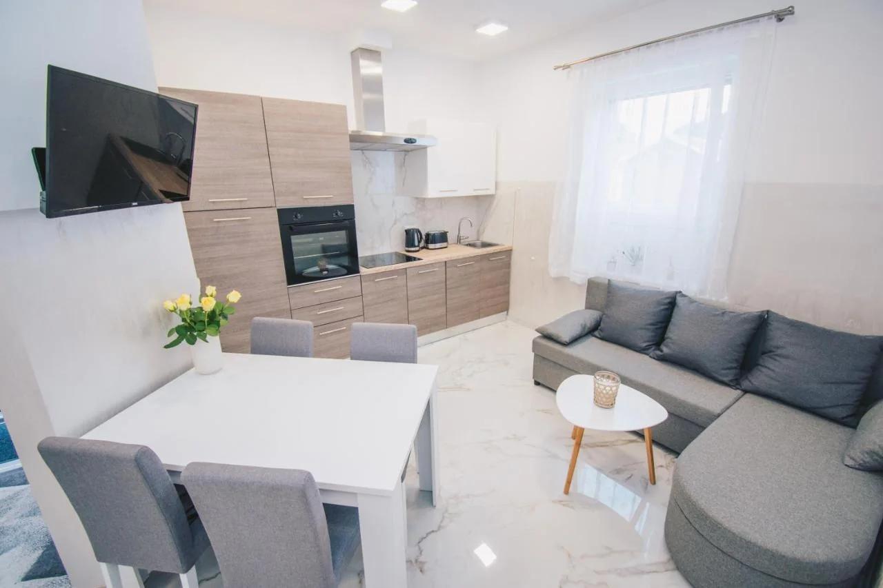 L Apartment photo