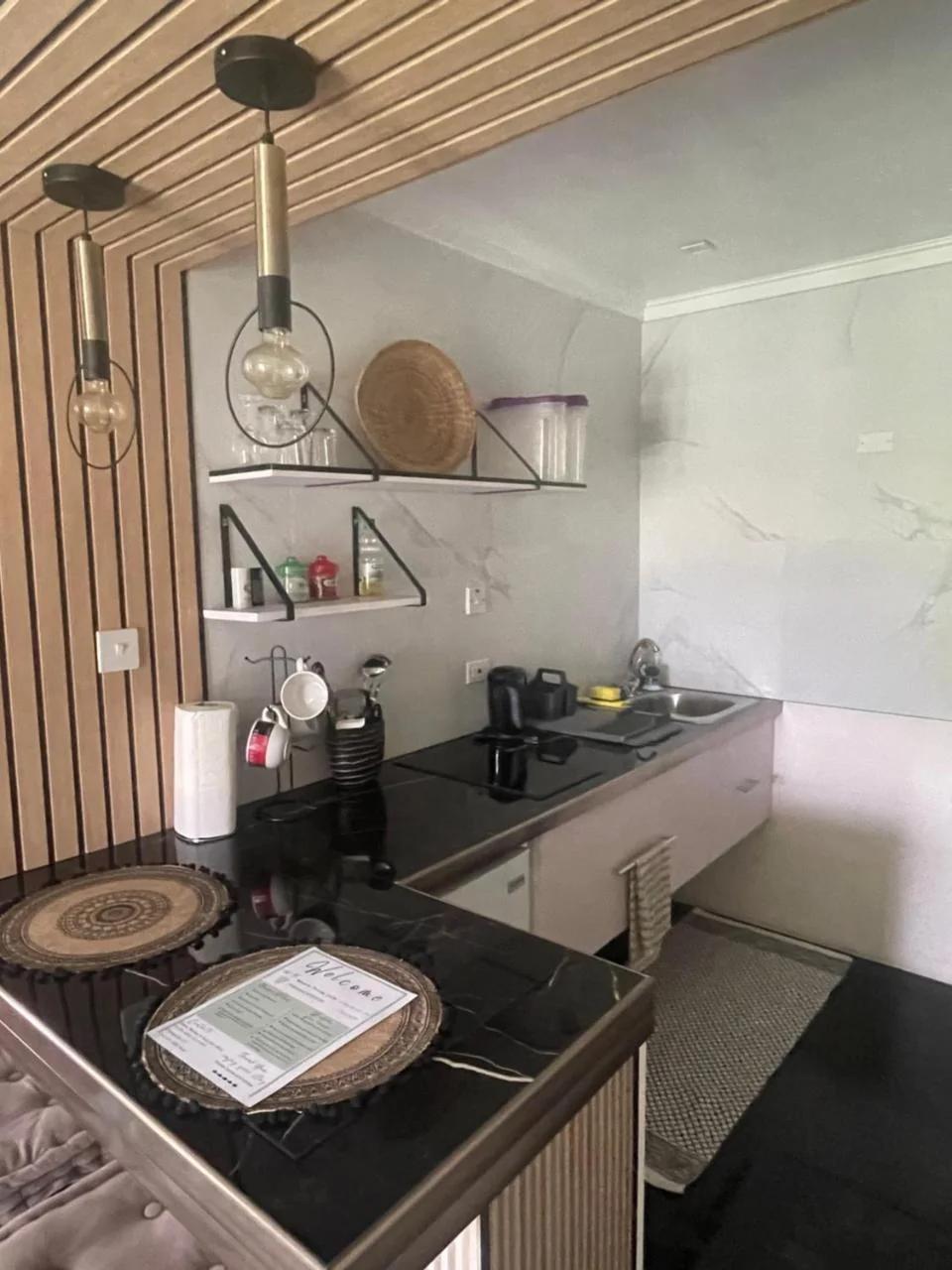 Scarlett Studios 1-US EMBASSY & America Uni 7 Mins Drive- Lloyd Erskine Centre & Ross Uni 5 Mins Drive - Holidays-The 1 Night Res Inc AIRPORT & EMBASSY Round Trip Breakfast Optional -Choose Opt 2 For Car Rental with Accommodation photo