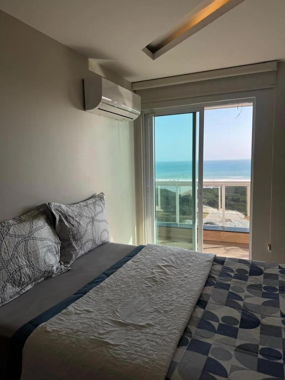 Apartamento de frente para o mar foto