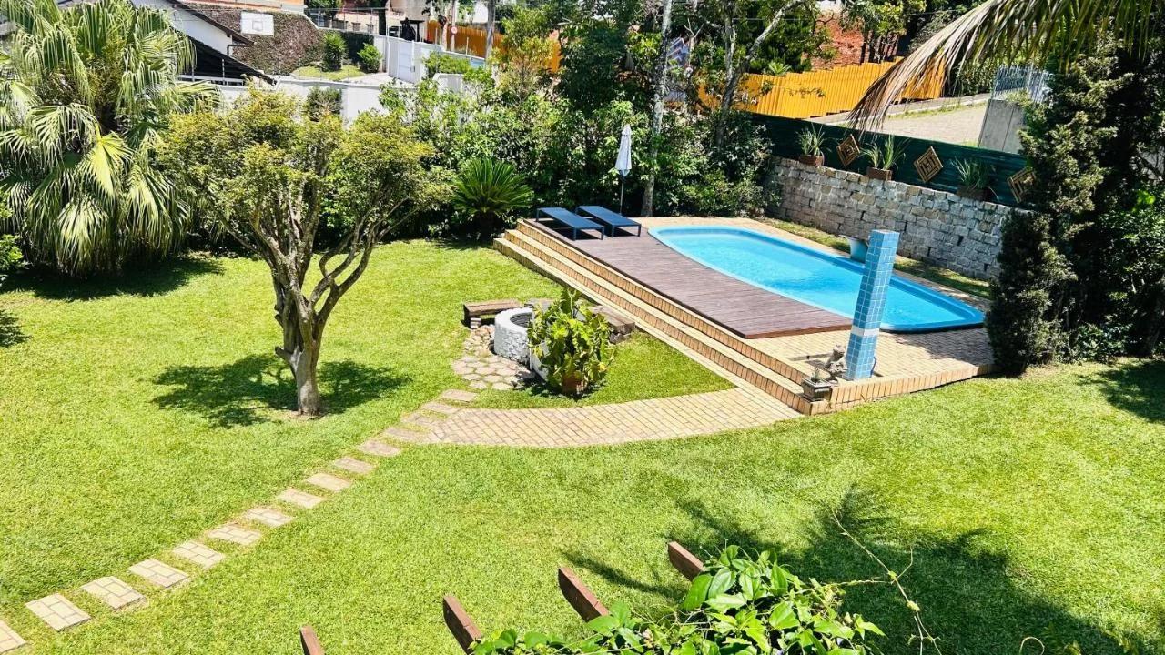 Casa Canasvieiras Florianópolis com piscina e mar foto