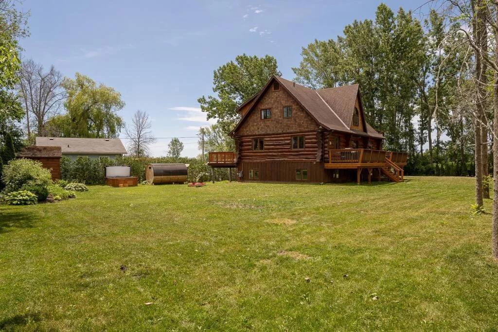 Unique Log House by the Lake, Retreat with Spa Amenities near Presque'ile Provincial Park photo