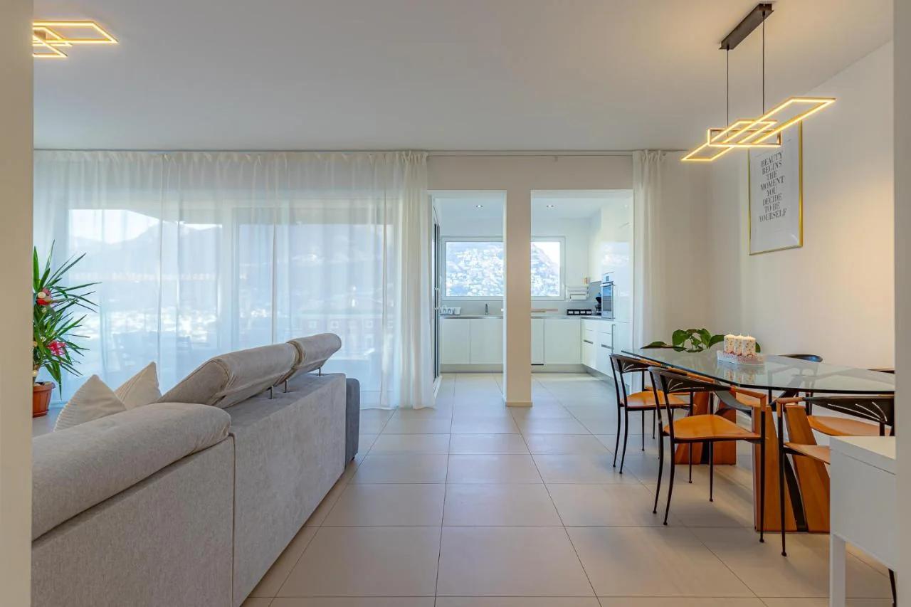 IMPERIAL of LUGANO 3 with a lake view behind the station and 10 min from the lake of Lugano photo