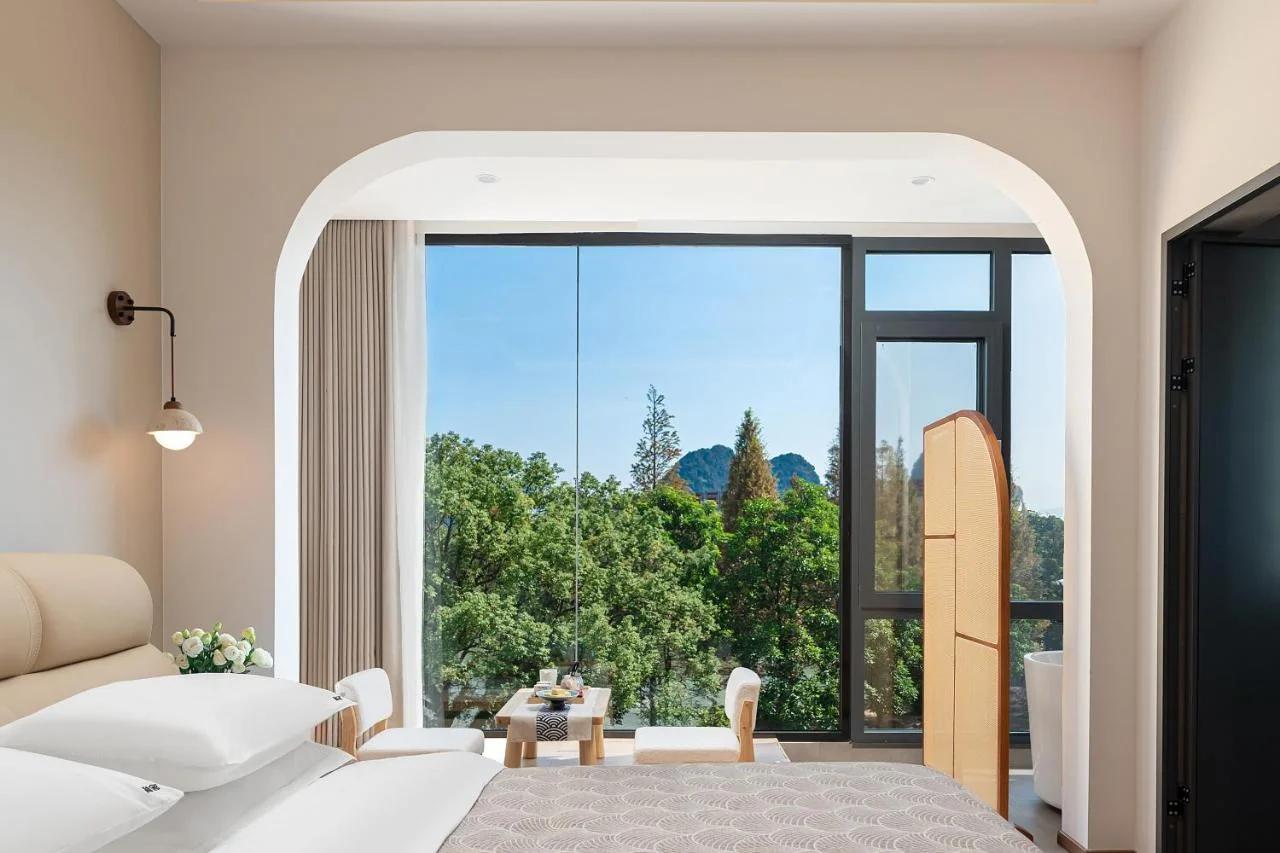 He She Courtyard Free pick-up train station stay 3 nights photo