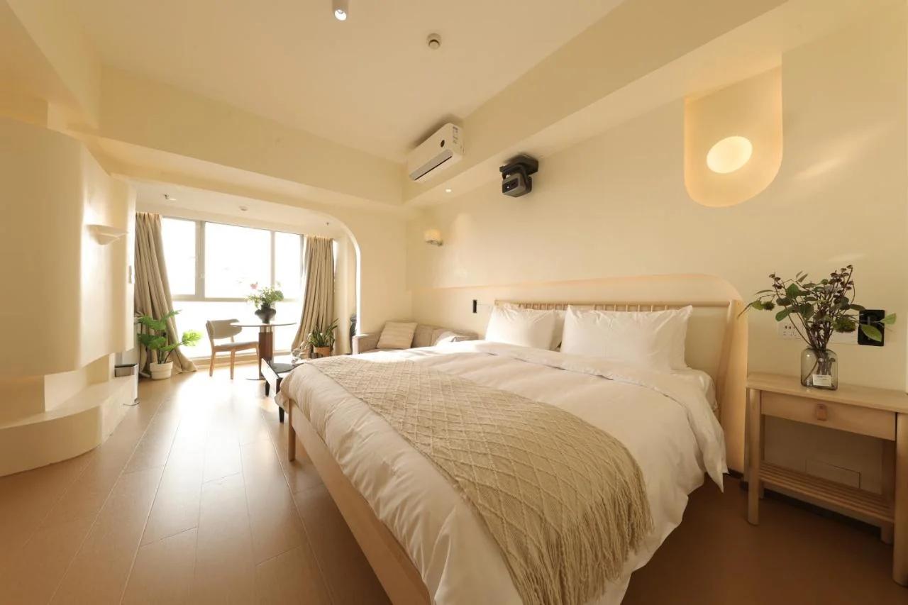 Huayue Apartment Hotel - Shanghai & Metro Line 18 Zhoupu Station华悦酒店上海浦东万达广场店 photo