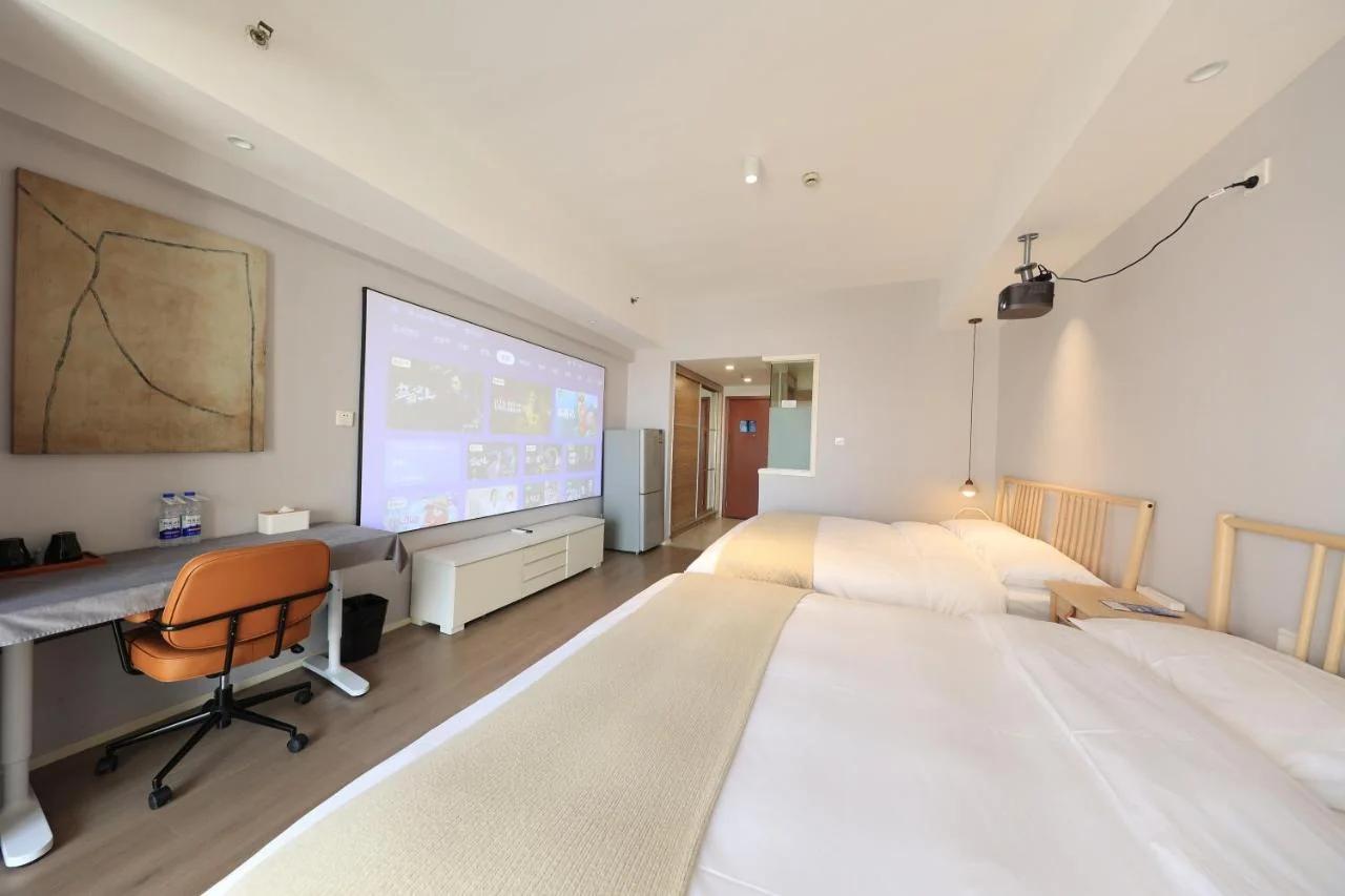 Huayue Apartment Hotel - Shanghai & Metro Line 18 Zhoupu Station华悦酒店上海浦东万达广场店 photo