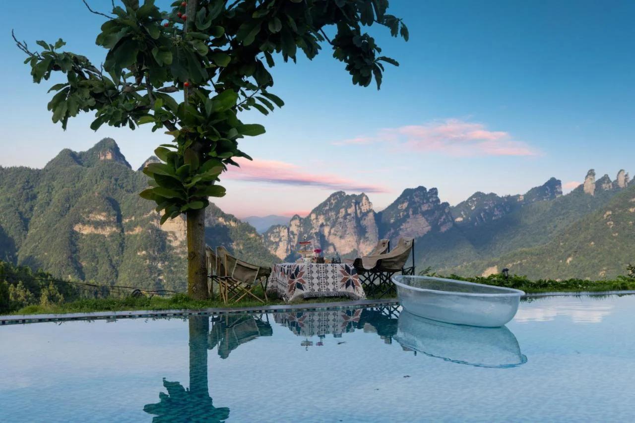 Zhangjiajie Flowers Valley,Watching Sunrise Cloud Sea, enjoying an infinity pool, free Chinese and Western breakfast, and free shuttle service to the entrance of the National Forest Park photo