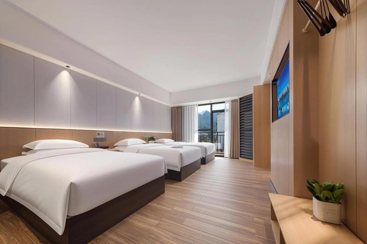 Zhangjiajie National Park Resort Hotel - Mtn view&River view&Courtyard view-Free delivery to the East Gate once, self-service washing machine with drying, luggage storage photo