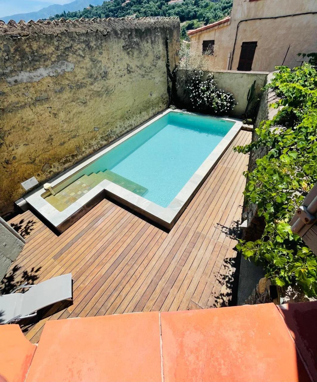 Air-conditioned authentic village house with sea view, terraces and swimming pool photo