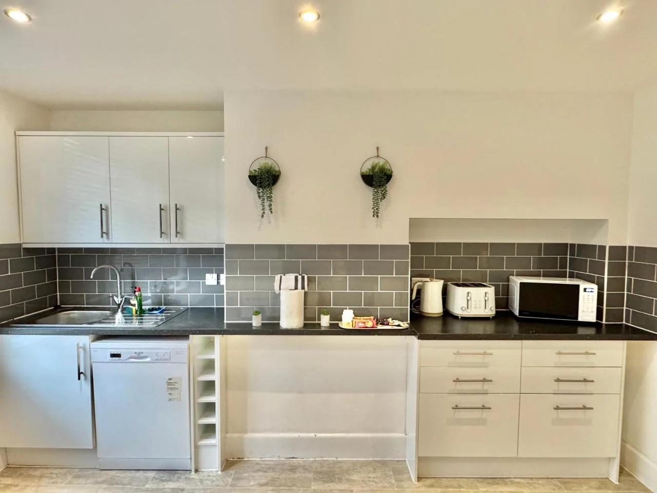 Three Bedroom Apartment with Garden and Parking - 2 Mins Walk to The Beach - Opposite BIC photo