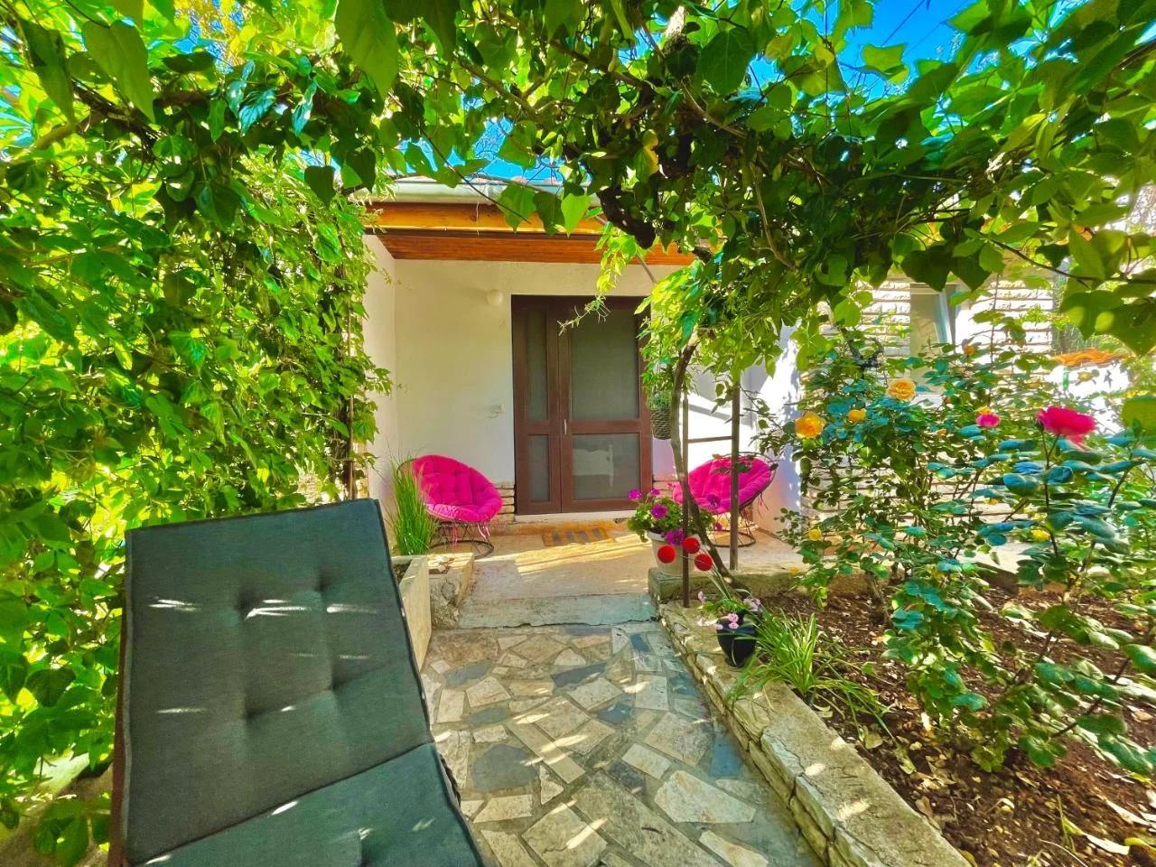 Lovely flower small house for two by the sea photo