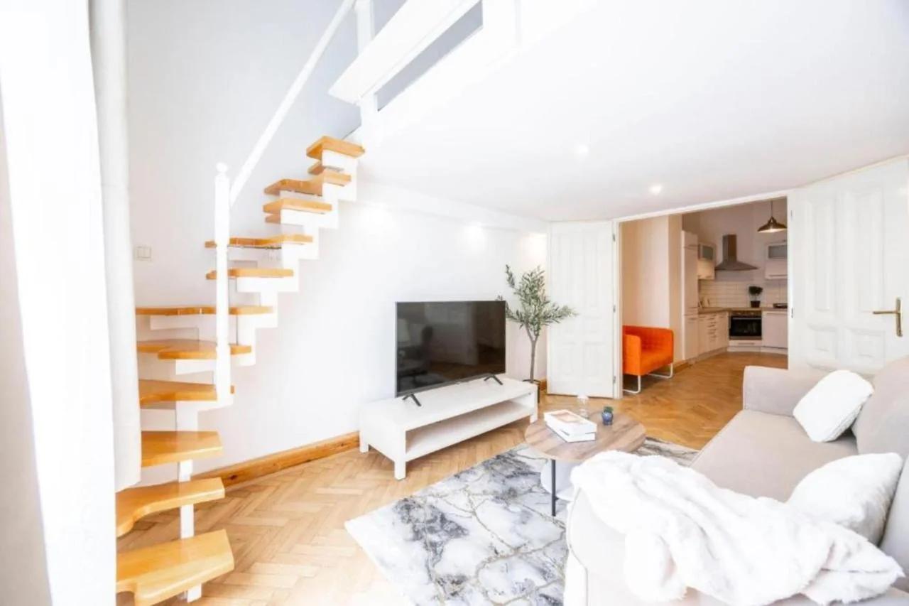 Modern Duplex Haven with Loft Charm photo
