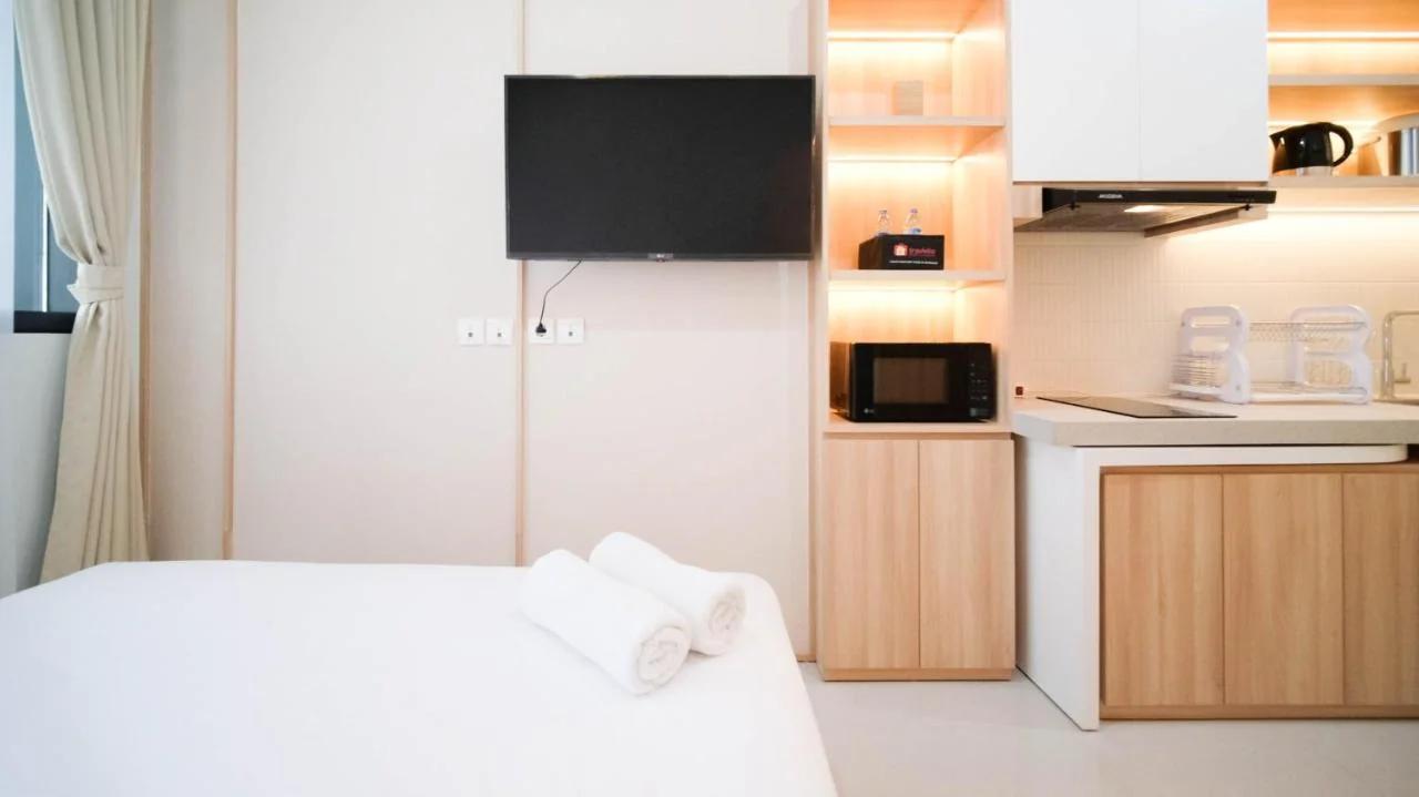 Cozy Studio Connected to Mall at The Vertu Apartment By Travelio photo