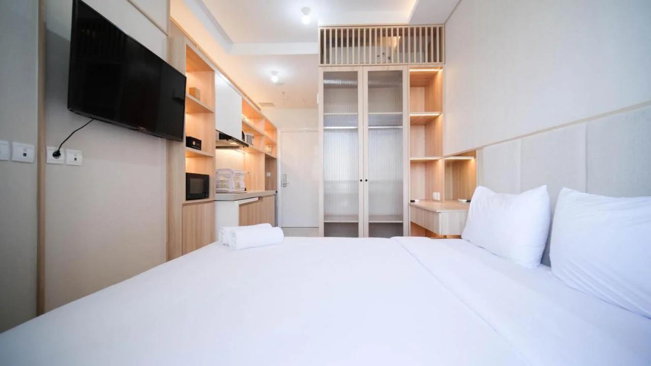 Cozy Studio Connected to Mall at The Vertu Apartment By Travelio photo