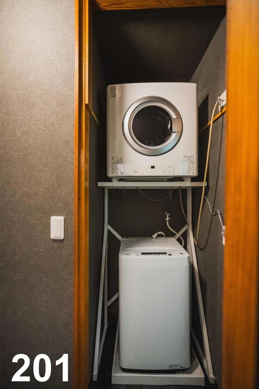 MOONLIGHT KEISEI KOIWA HOTEL 2-Minute Walk from Keisei Koiwa Station Washer & Dryer Included Completely Non-Smoking Perfect for Long Stays Direct Access to Ueno, Asakusa, and Narita Airport photo