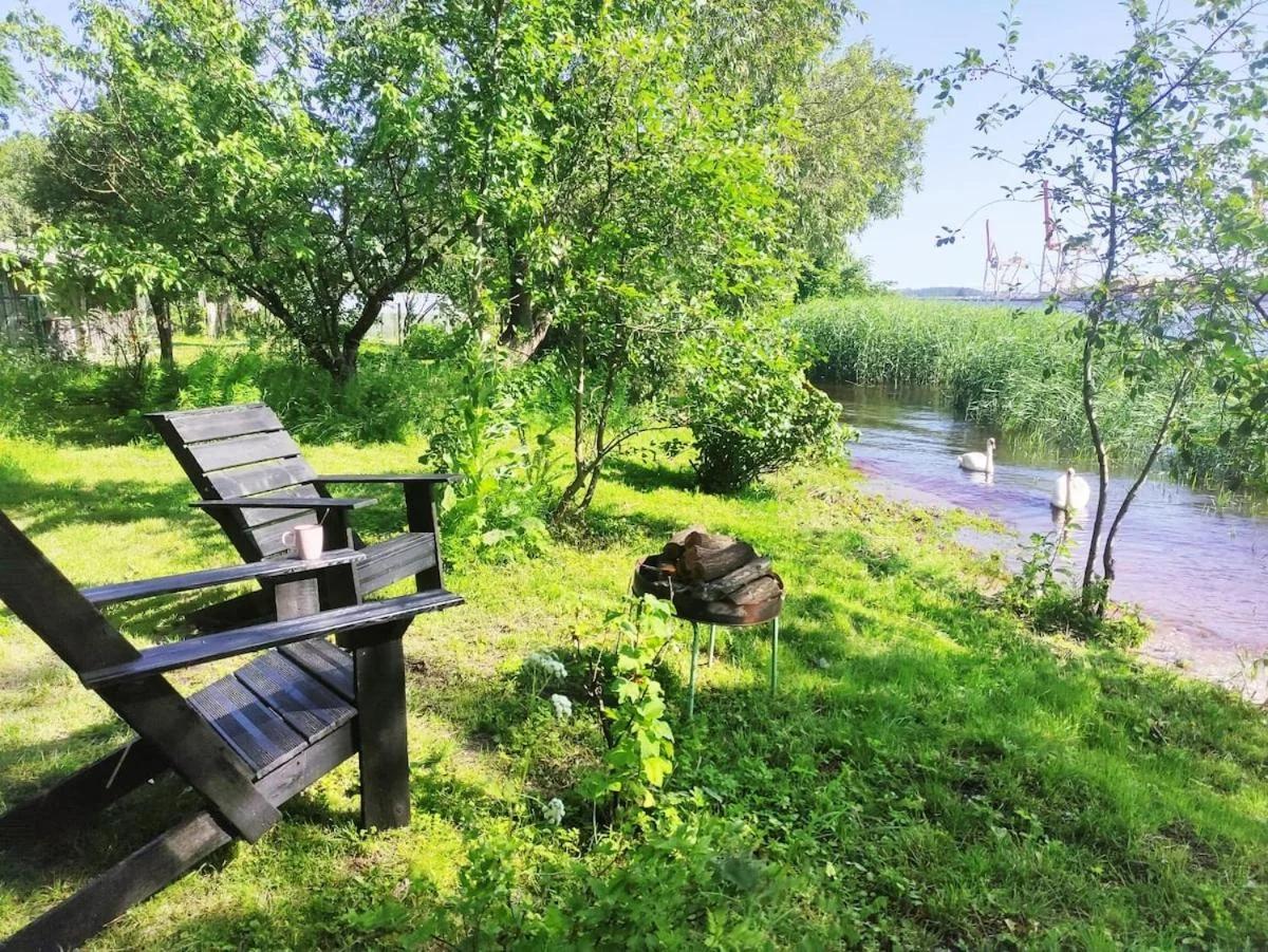 Minimalist riverside hideout photo