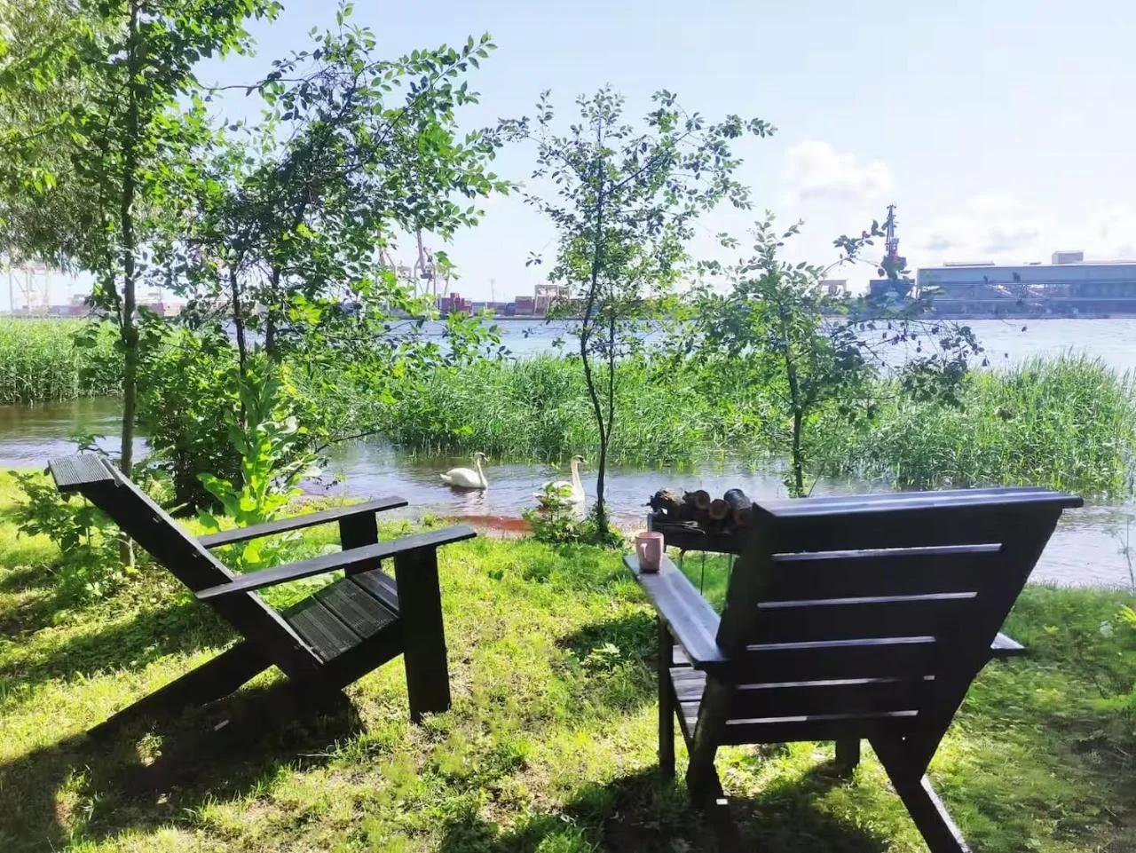 Minimalist riverside hideout photo