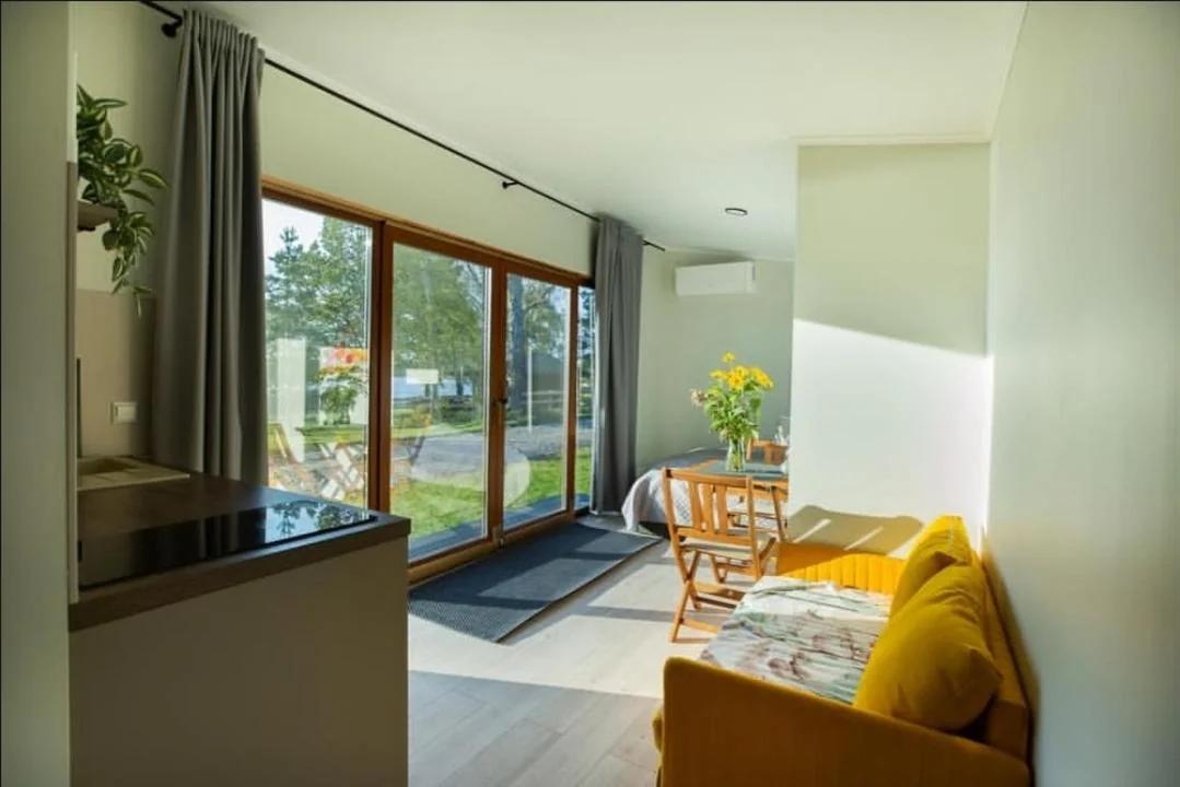 RiverView Cozy Cabins in Jurmala with fishing opportunity photo