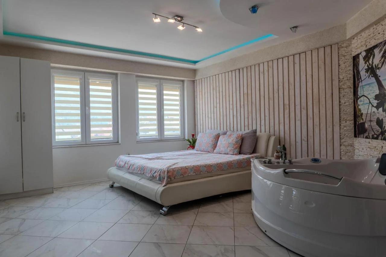 Couples Apartment with Jacuzzi - Near the Lake photo