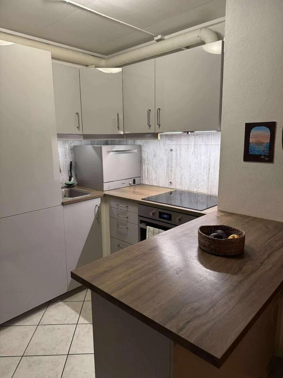 Bright and comfortable Tromsø apartment with easy airport access, parking and nature nearby photo