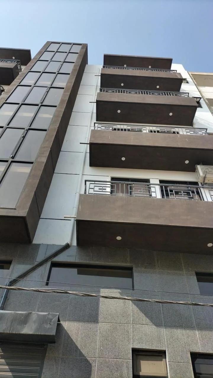 Travellers Heaven 3BR APT DHA PHASE VI Nishat Commercial photo
