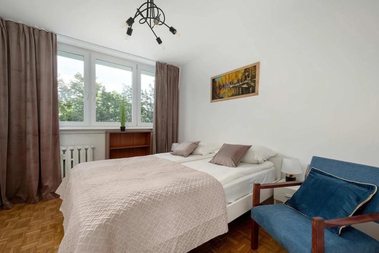 Blue Two Bedroom Apartment in Wrocław with Desk, Bathtub and Balcony by Noclegi Renters photo