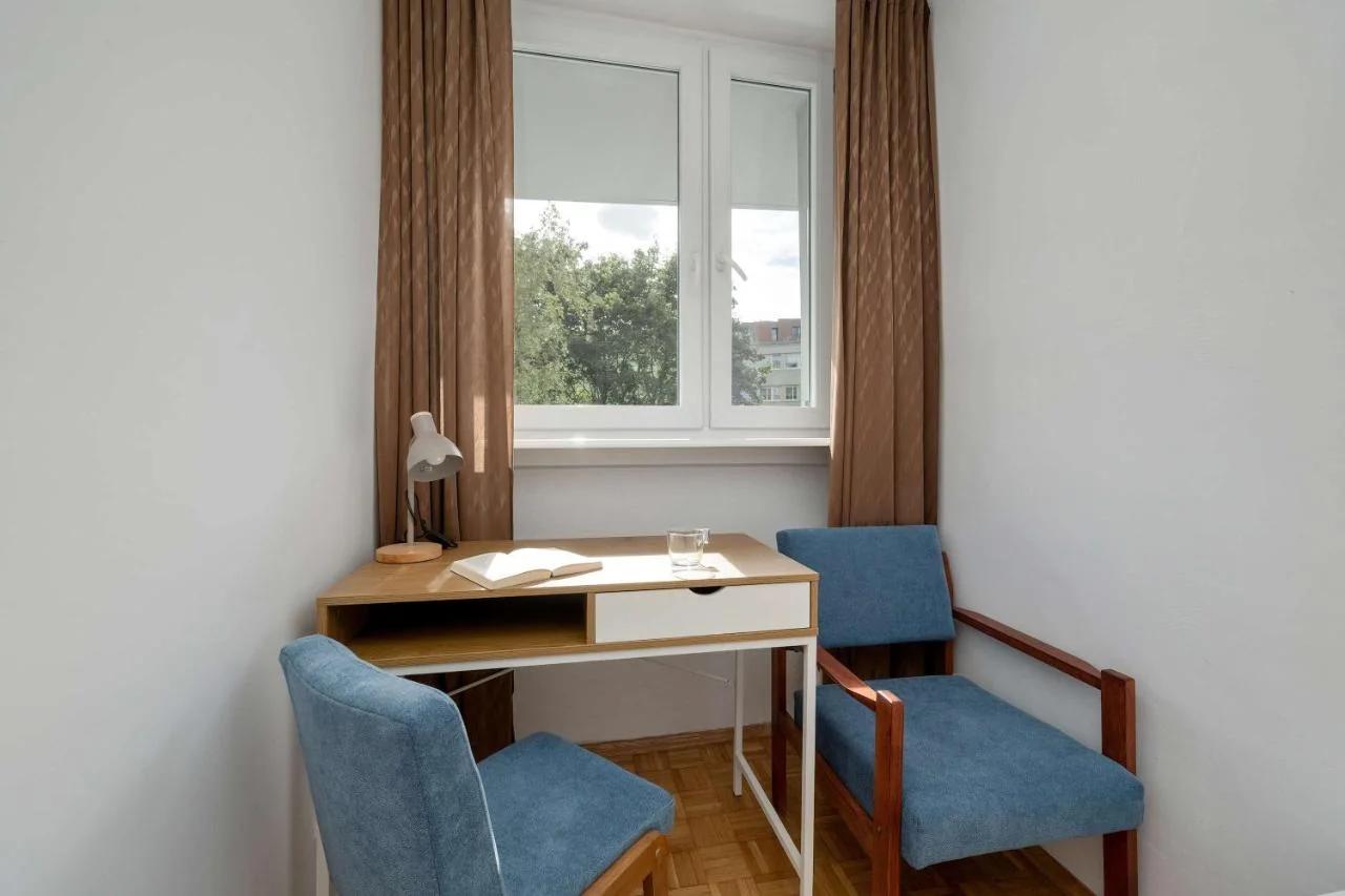 Blue Two Bedroom Apartment in Wrocław with Desk, Bathtub and Balcony by Noclegi Renters photo
