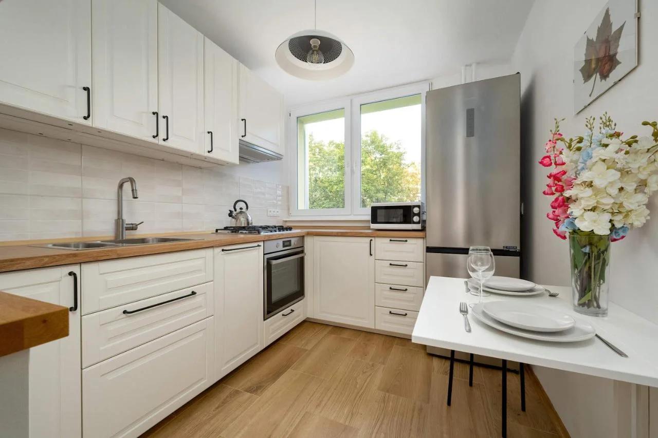 Blue Two Bedroom Apartment in Wrocław with Desk, Bathtub and Balcony by Noclegi Renters photo