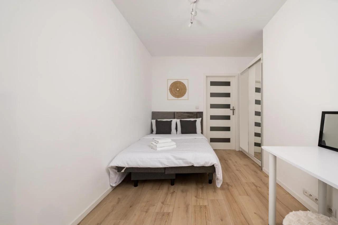 Rondo Wiatraczna Harmony Apartment by BookingHost photo