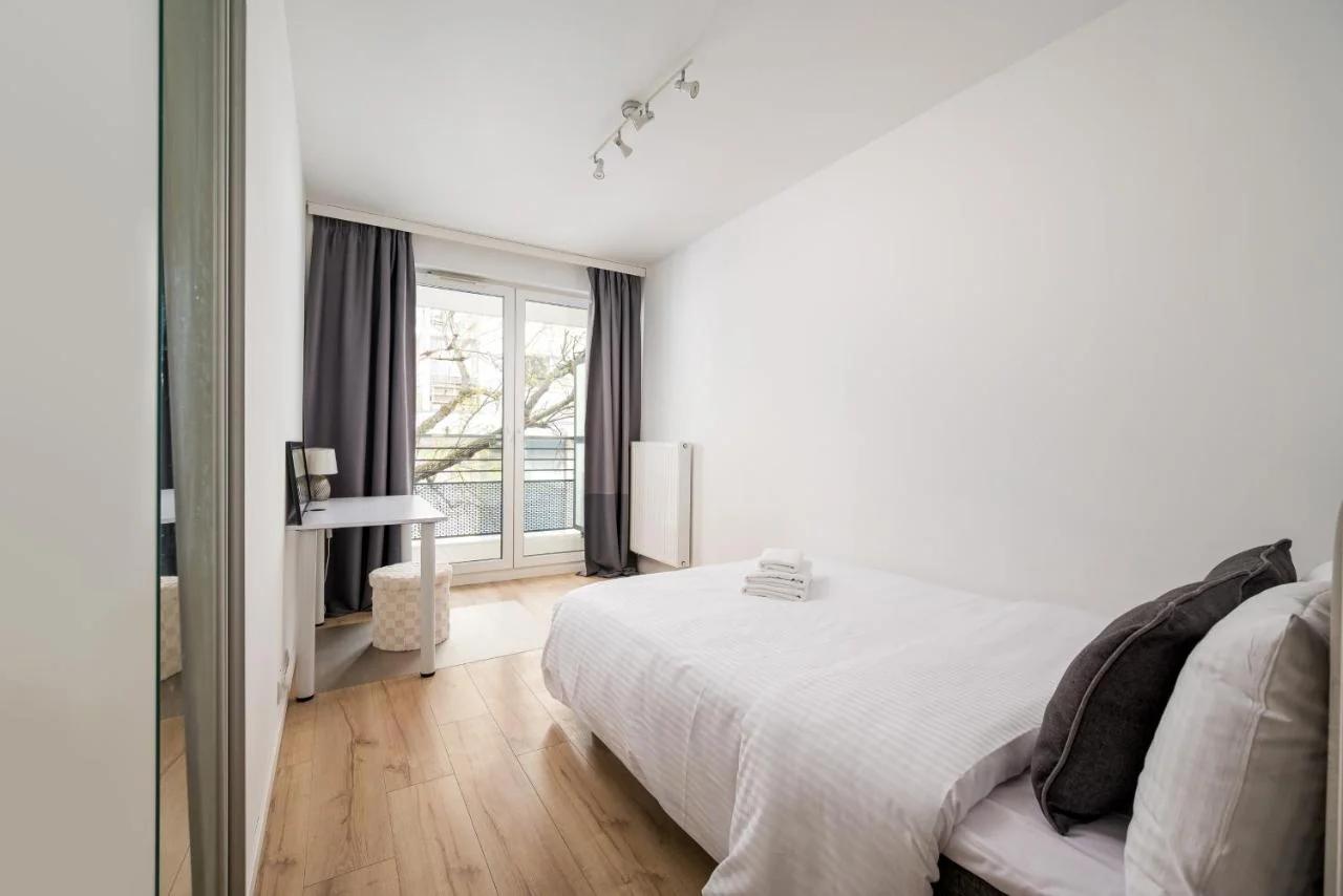 Rondo Wiatraczna Harmony Apartment by BookingHost photo