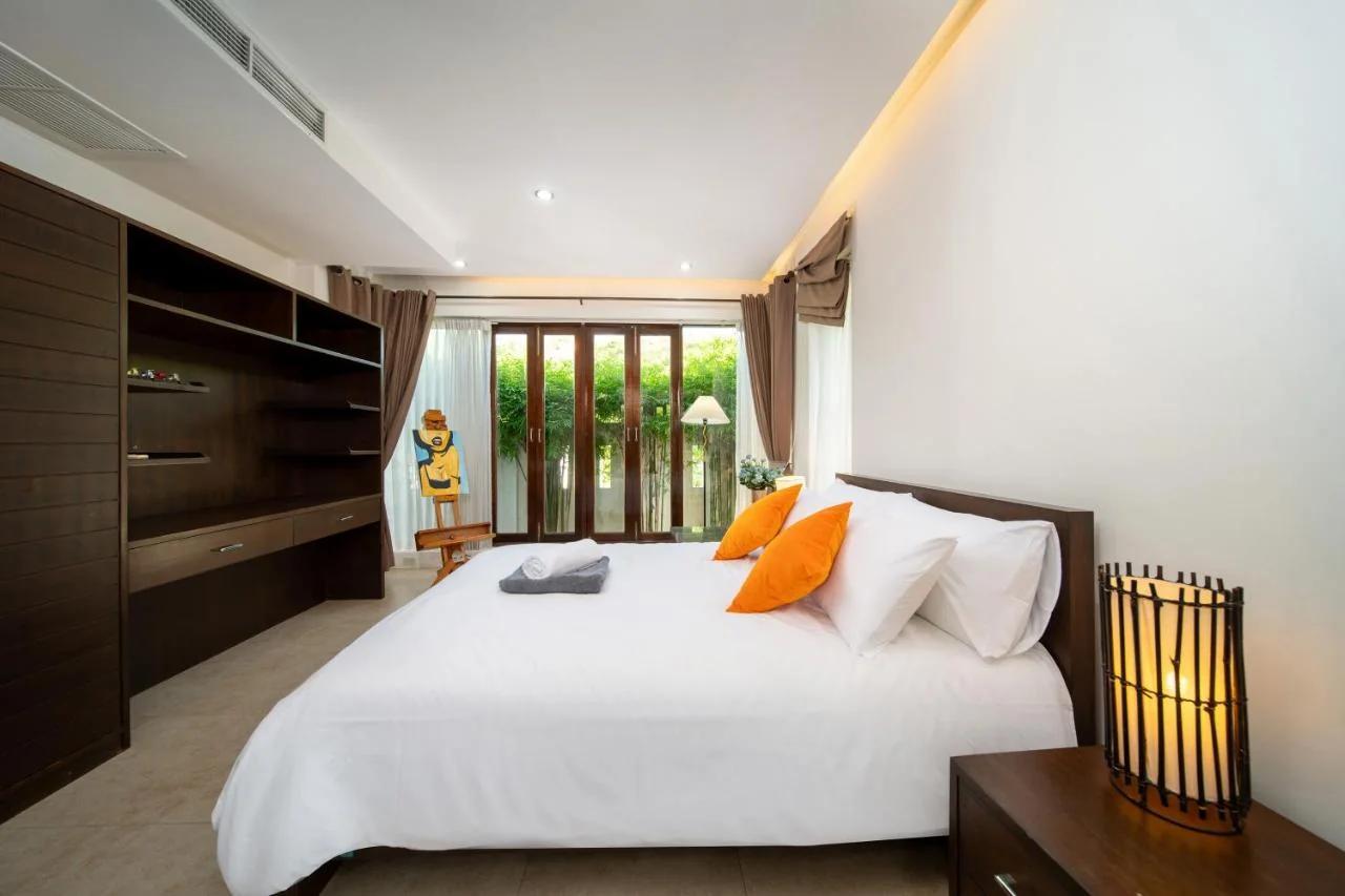 Tropical Pool Villa Thai-modern Villa with an OFFICE photo
