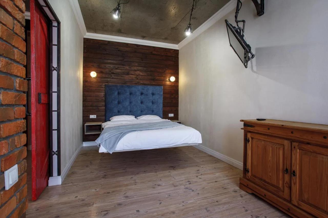 Loft with a swing and side sea view photo