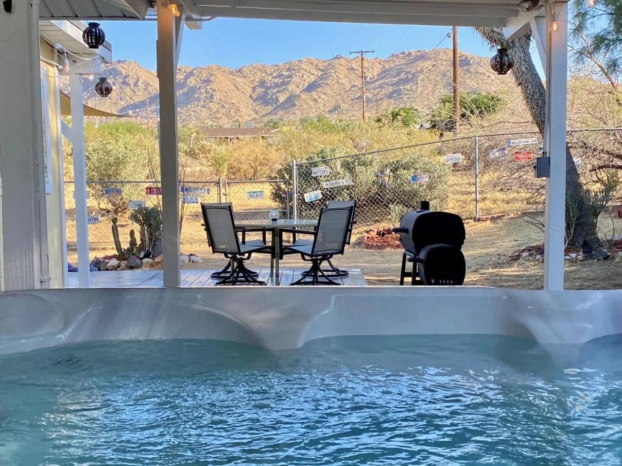 10 minutes to JTNP - Saltwater Float Pool, Hot Tub, Telescope, Fireplace and Views photo