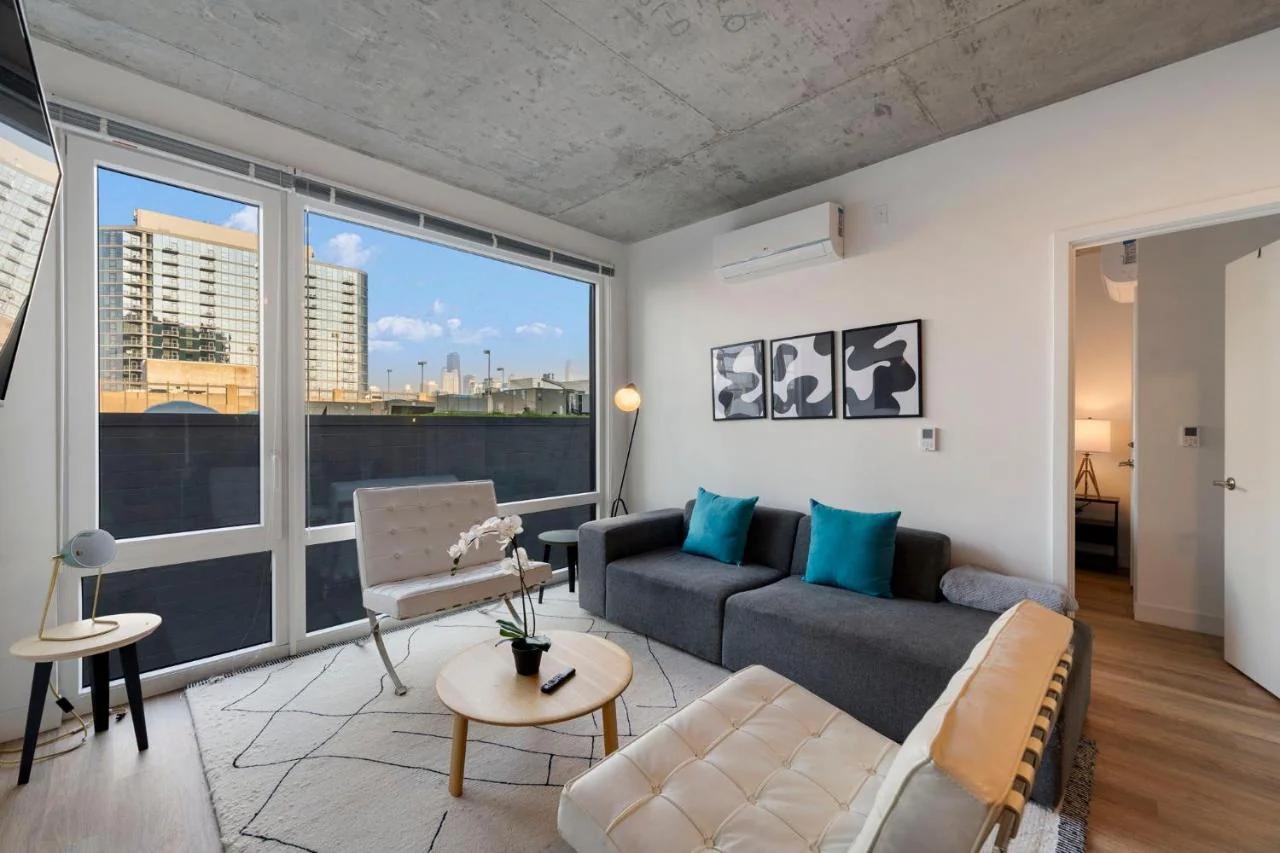 Chic 4-Bedroom with Skyline Views & Amenities photo