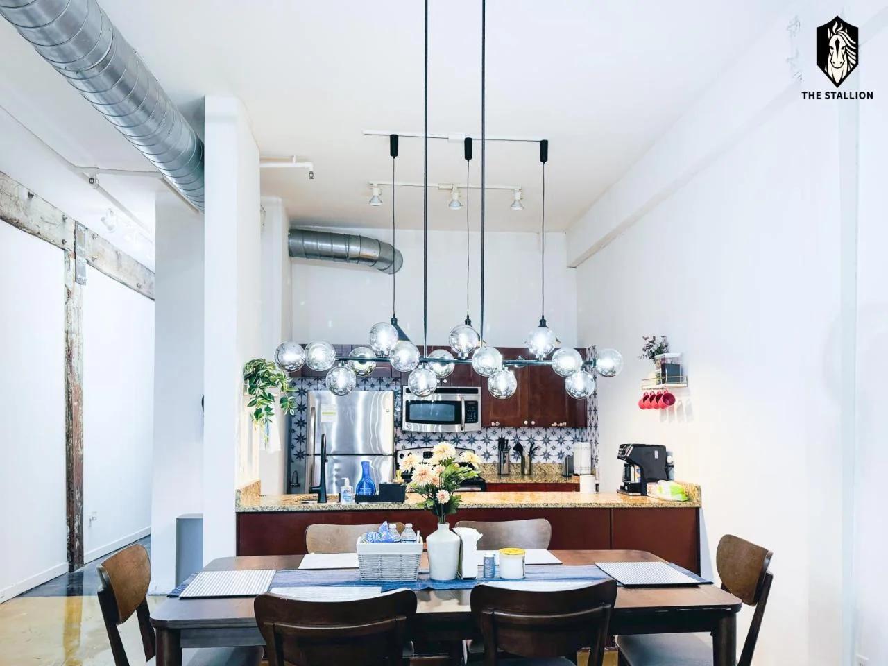 The Stallion #101 - 1BD Modern Loft with Private Patio - Walk to various attractions photo