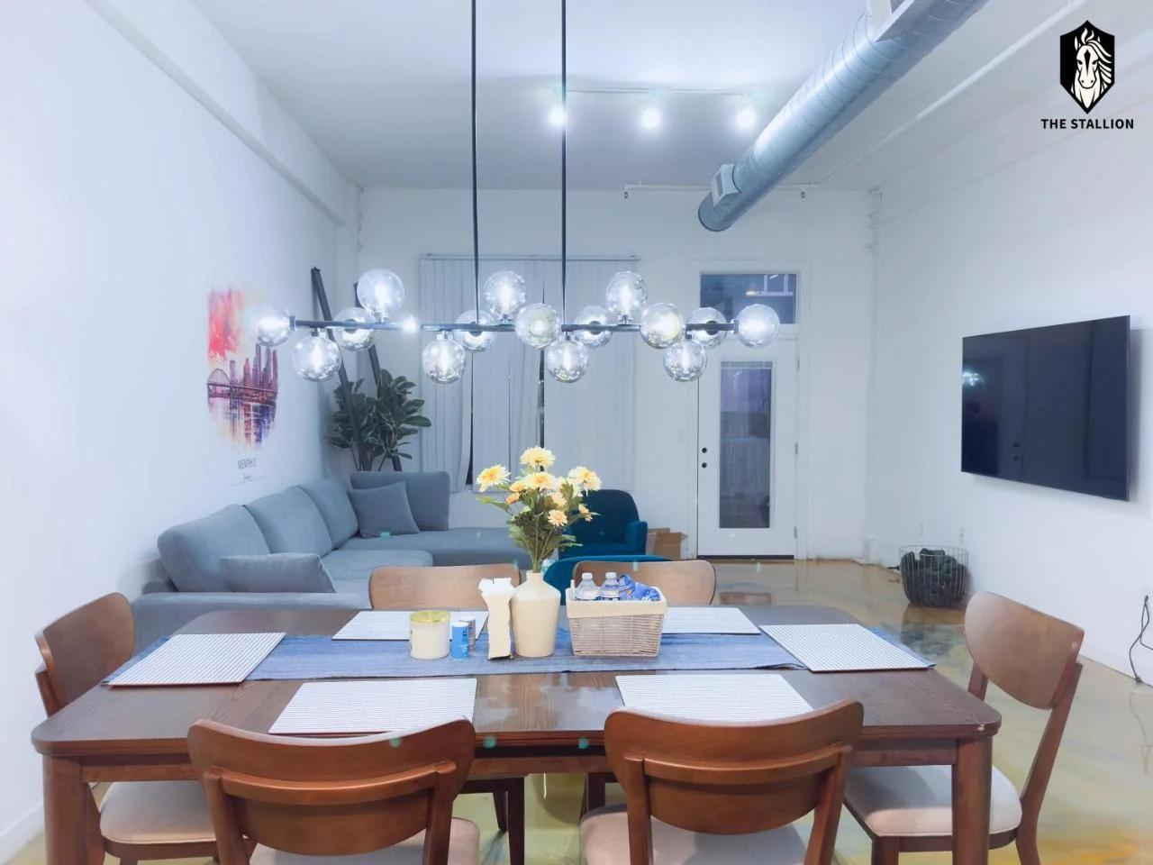 The Stallion #101 - 1BD Modern Loft with Private Patio - Walk to various attractions photo