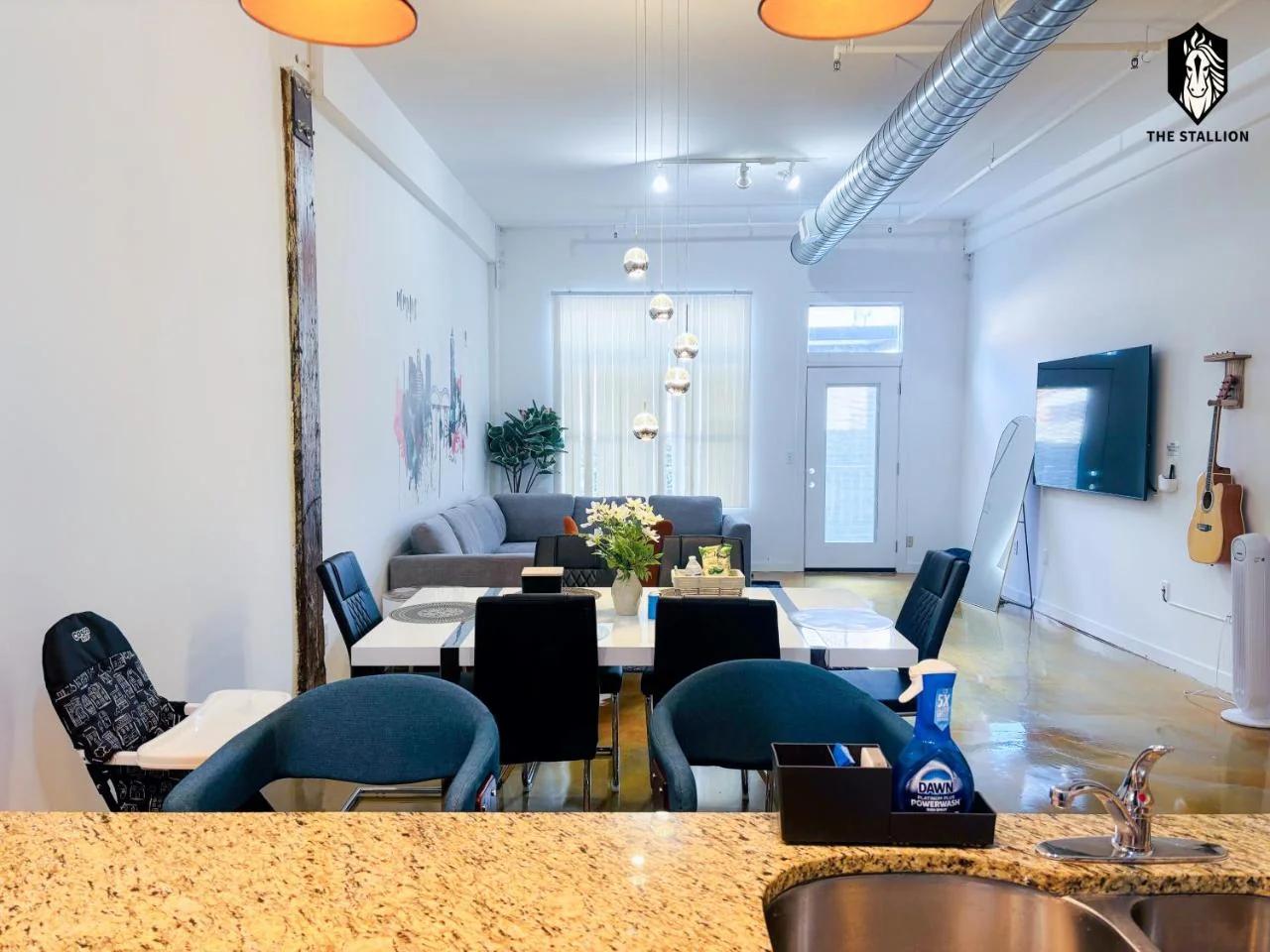 The Stallion #104 - Brand New Modern Spacious Loft with Patio - Walkable to attractions photo