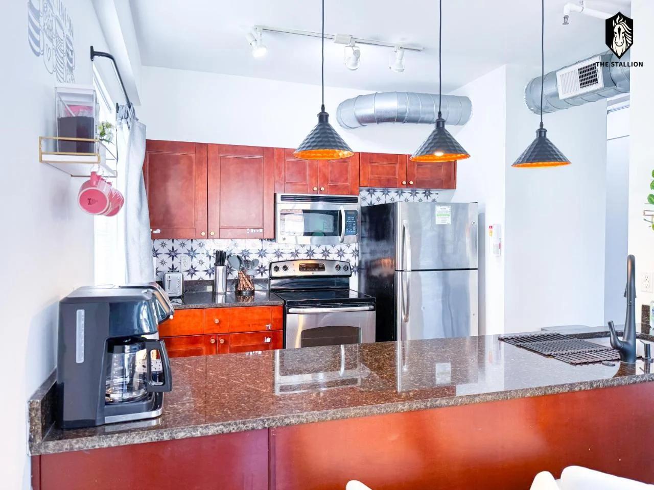 The Stallion #205 - Modern Spacious Loft in Downtown - Walkable to attractions photo