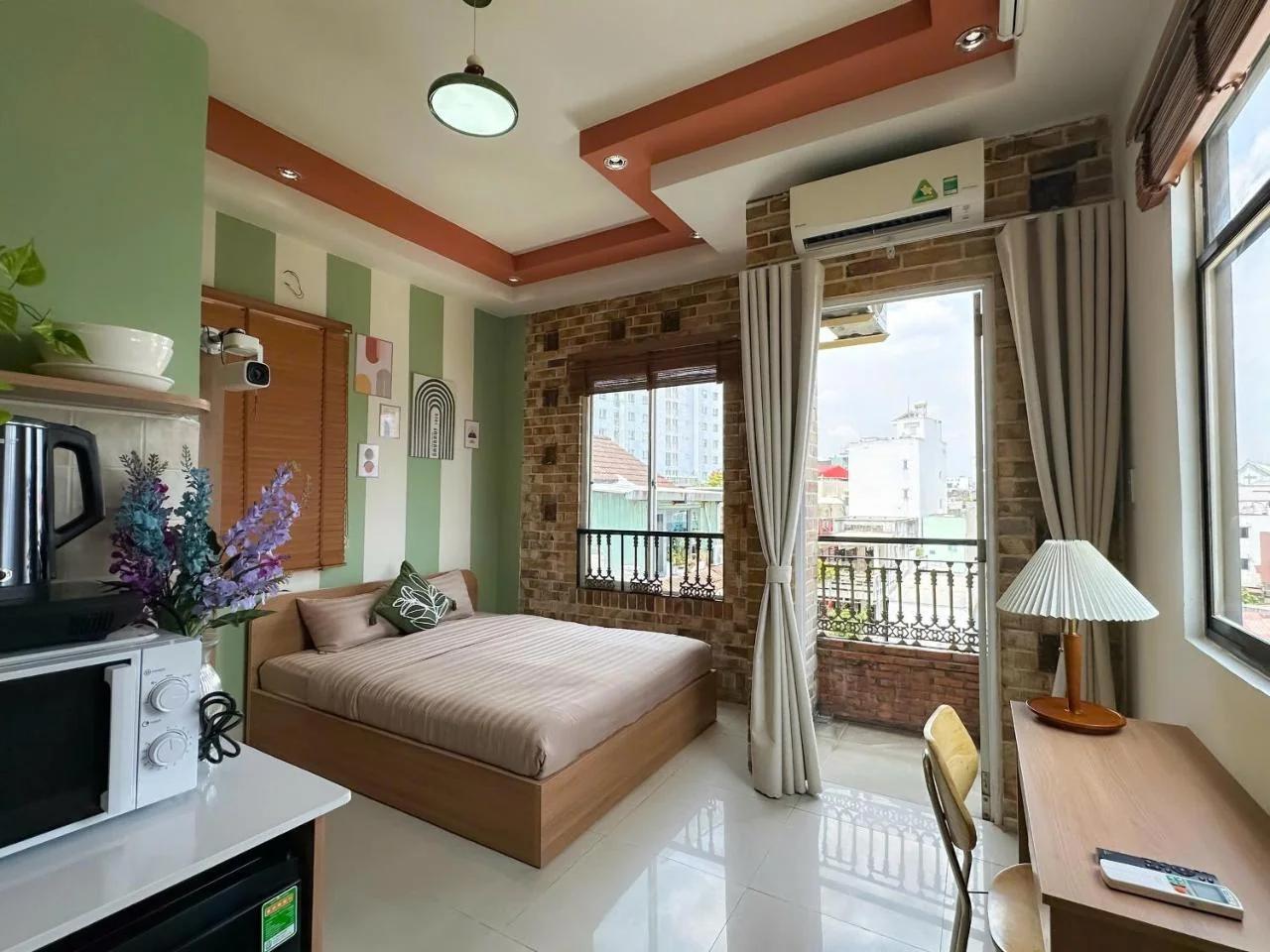 Saigon Riverside Retreat - Bright Balcony Studio with City View near Ben Thanh Market photo